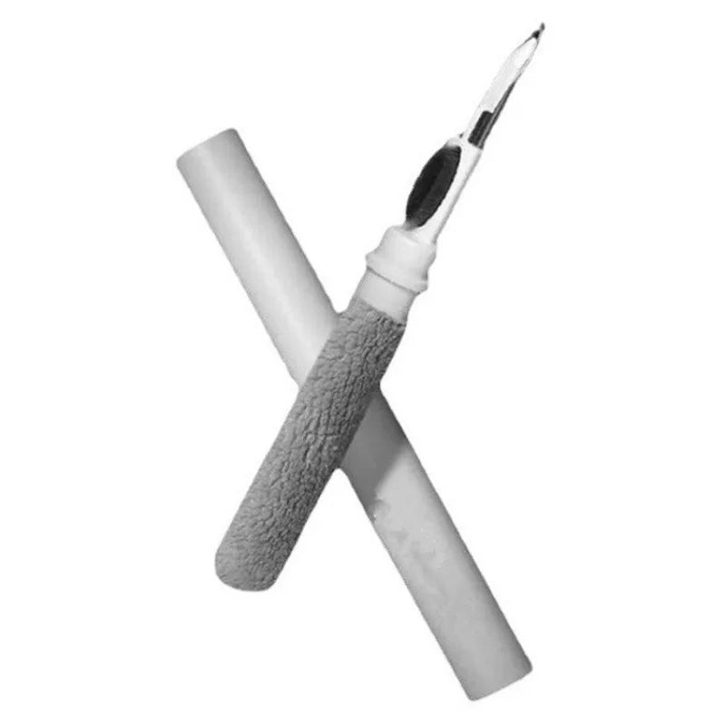Seam ripper tool with protective cap, textured handle, on white background from khadim.shop