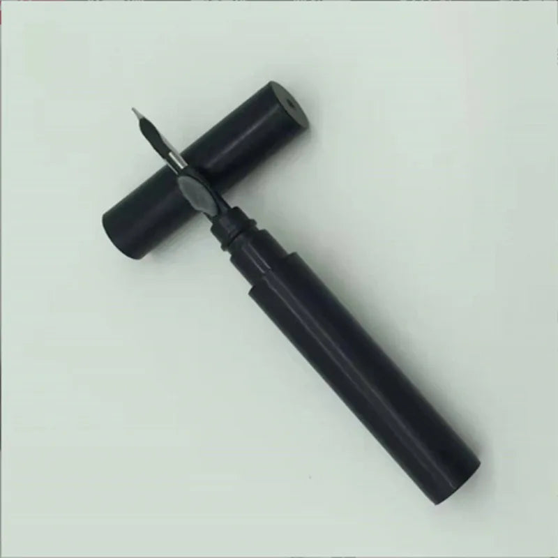 Black liquid eyeliner pen with open cap on white background, khadim.shop beauty product
