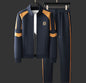 Navy tracksuit with yellow accents on a gray background